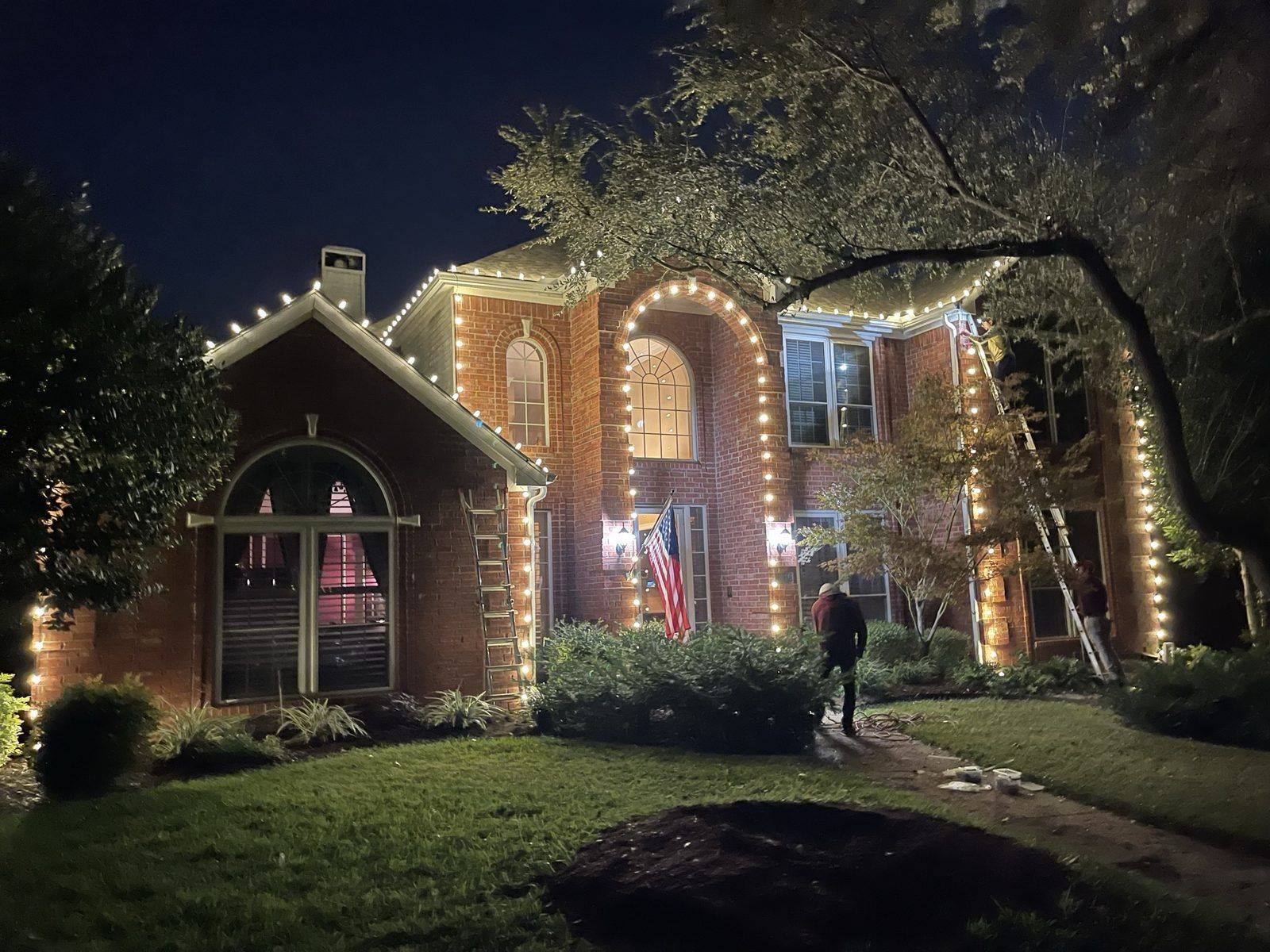 Christmas light installer Allen TX brick estate at night Christmas light installer Allen TX brick estate at night