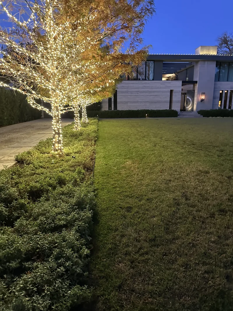 Christmas light installation Dallas TX — warm white roofline on a Mediterranean estate