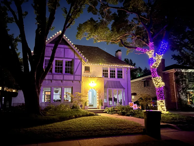 Christmas light installation Stonebriar Country Club TX — warm white roofline with purple accent uplighting on a luxury estate