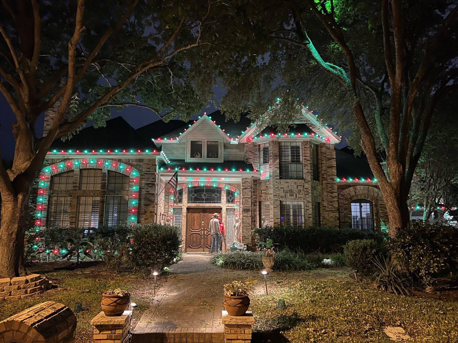 Luxury Christmas light installation Lucas TX estate with all trees wrapped warm white Luxury Christmas light installation Lucas TX estate with all trees wrapped warm white